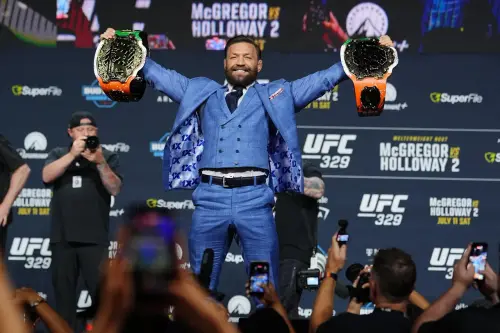 McGregor Belts Out Oasis Classic at UFC 329 Press Conference