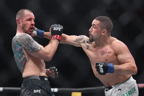Whittaker Delivers Devastating Light Heavyweight Debut, Possibly Fractures Krylov's Jaw at UFC 329